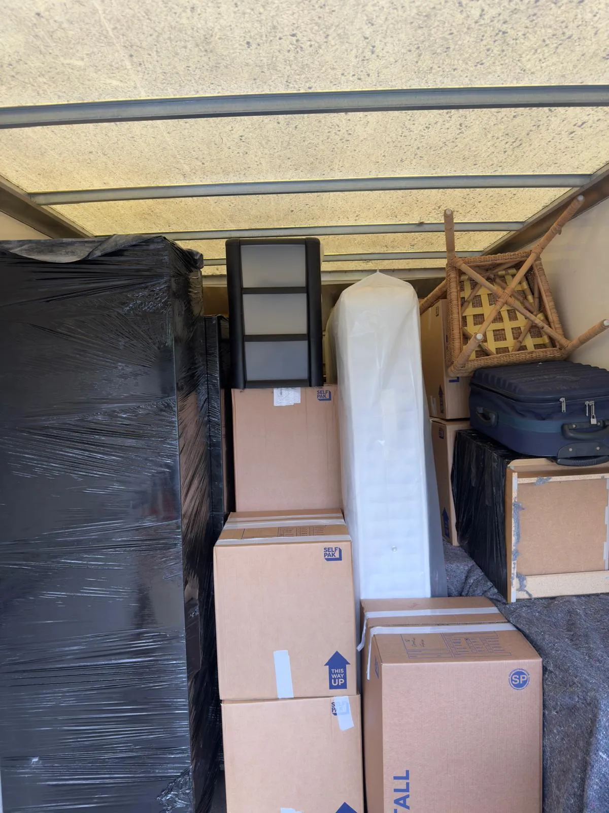 Blankets protecting furniture during a house move