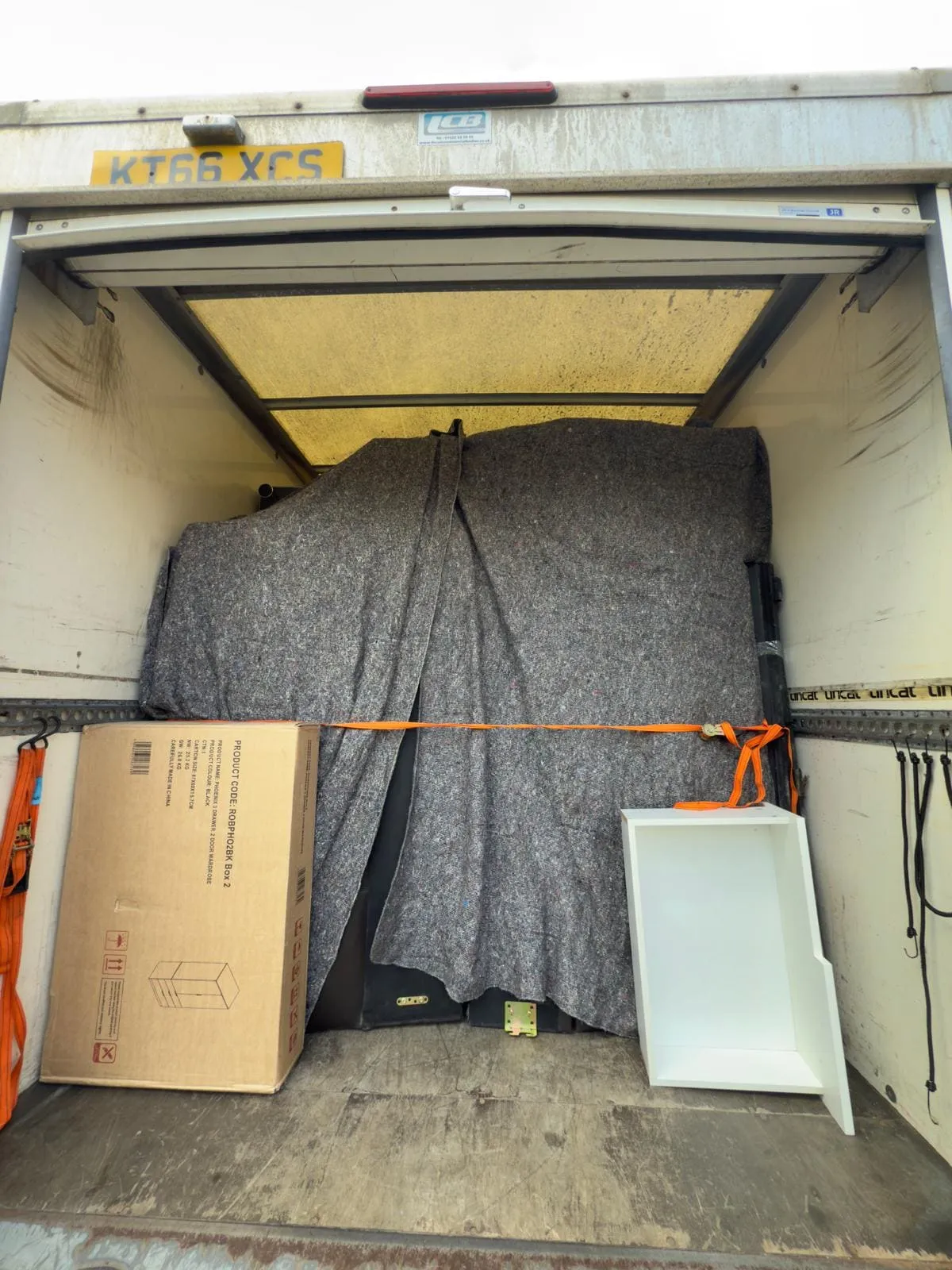 An upright piano protected before being moved