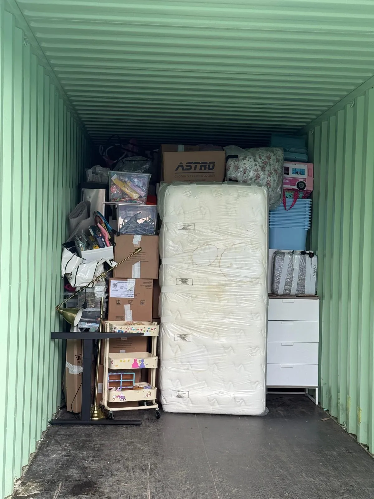 Boxes and wrapped furniture stored between moves